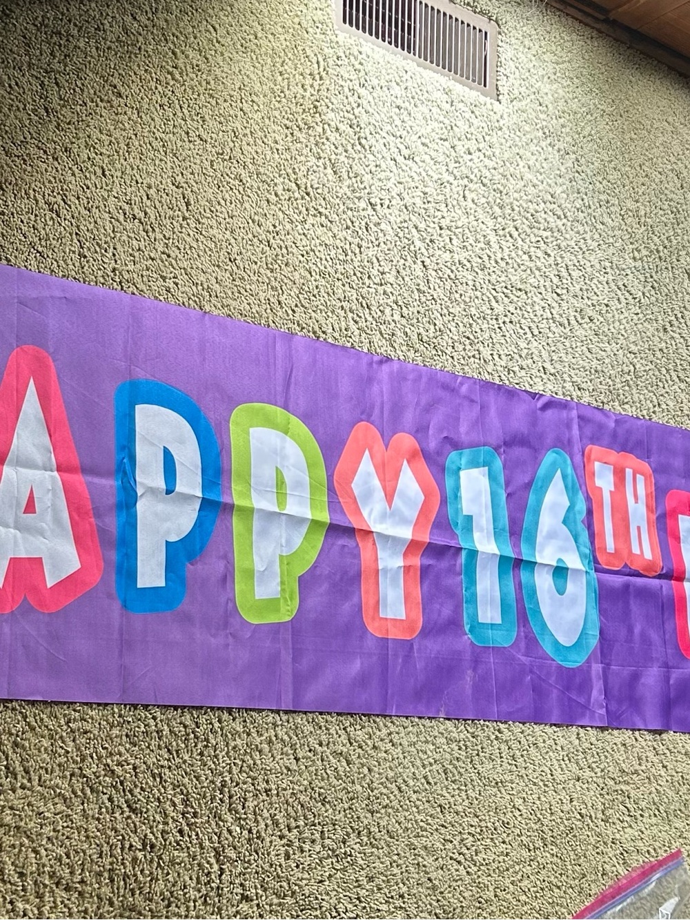 Purple 'Happy 16th' Party Banner with Multicolor Letters